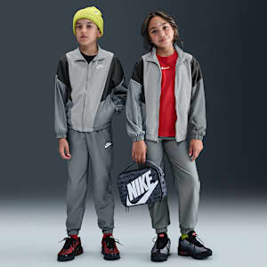 Nike Sportswear Older Kids' Woven Tracksuit. Nike UK